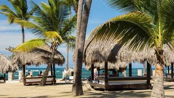Private beach, white sand, free beach cabanas, sun-loungers