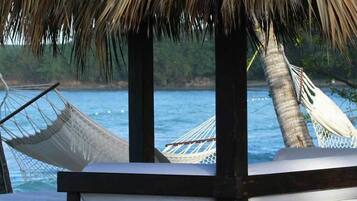 Private beach, white sand, free beach cabanas, sun-loungers