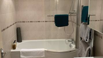 Hair dryer, towels, soap, shampoo