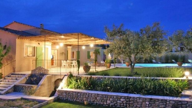 A villa with a swimming pool, stone steps, and a well-lit outdoor area. - House / Villa - Visan (Visan)