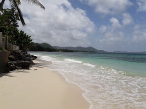 On the beach, sun loungers, beach towels