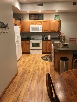 Condo, Multiple Beds (Downtown Condo with LAKE & BAY VIEW) | Private kitchen | Fridge, microwave, stovetop, dishwasher - Betsie Harbor Lodging (Frankfort)