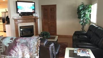 House, Multiple Beds (Family friendly lake house located at) | Living area | TV, fireplace, DVD player