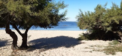 Peaceful haven with swimming pool near the port and beach