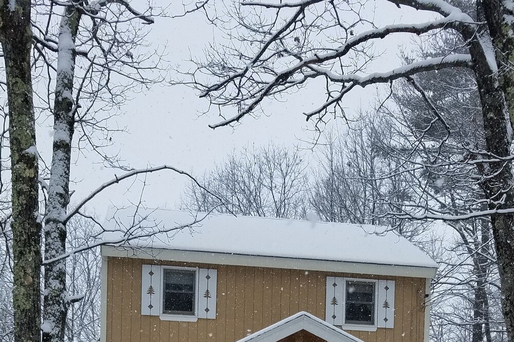 A Cozy House with a Winter Mountain View