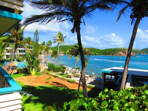 Relax by the ocean with a clear view of the expansive waters and lush tropical surroundings.