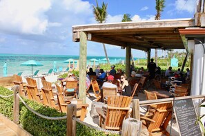 Outdoor dining - Stunning 2 bedroom 2100 sq ft, directly on Grace Bay Beach! (Providenciales)