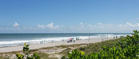 On the beach, sun-loungers, beach towels