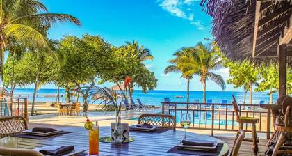 Frente a la playa | Piscina privada junto a la playa | Inmaculadamente mantenido | Resort de buceo privado