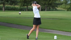 A golfer in a white shirt and black skirt on a golf course. - 25% DisCount;  Rarely Available, OCean View & Sunsets; Steps to Sand (Laguna Beach)