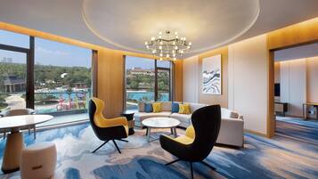 Suite, 1 Bedroom, Pool View | 1 bedroom, minibar, in-room safe, desk