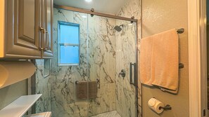 Shower, hair dryer, towels, soap