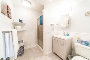 Shower, hair dryer, towels, soap