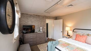 1 dormitori, escriptori, planxa i posts de planxar i wifi gratuïta