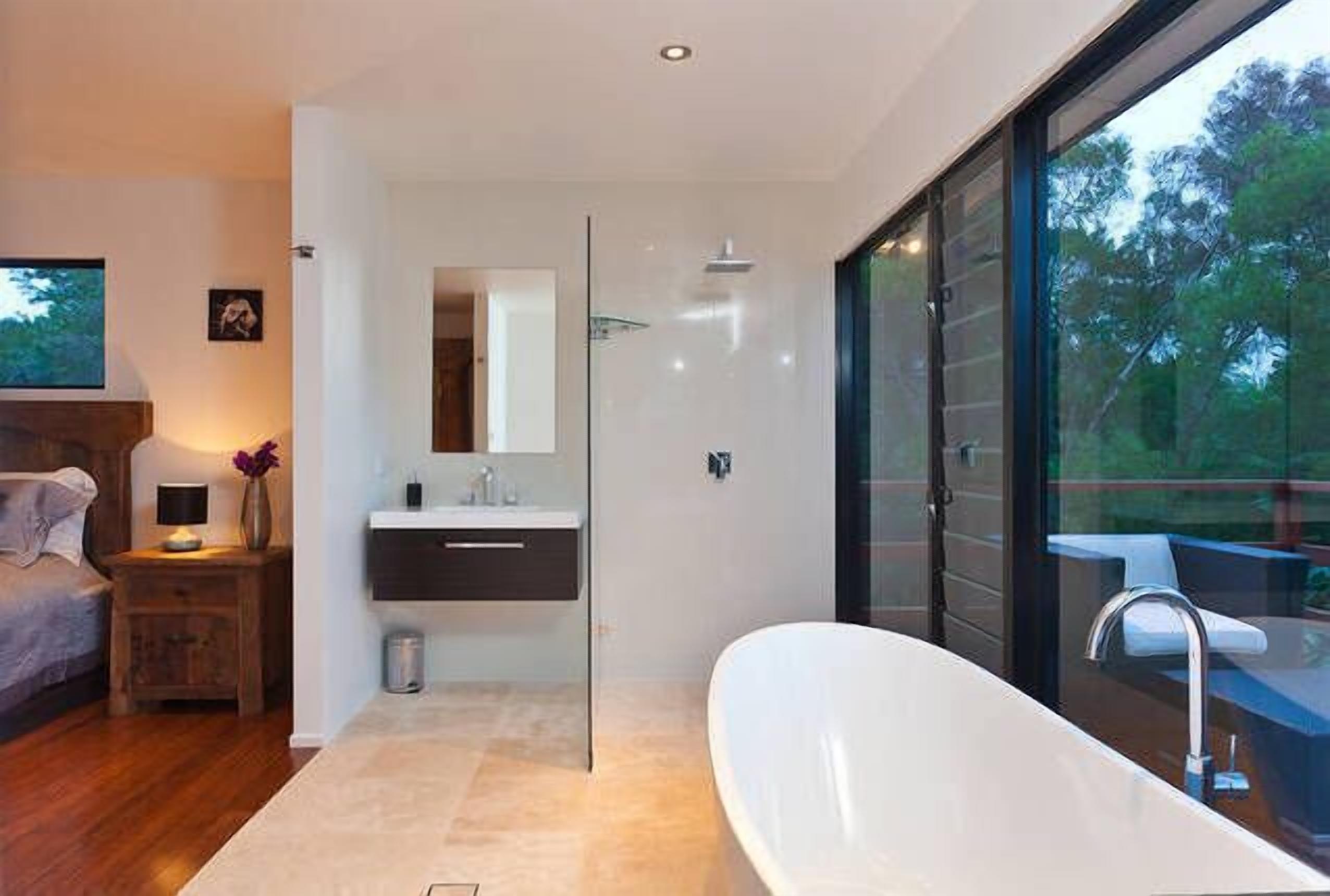 Bathtub, jetted bath, hair dryer, towels