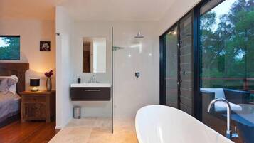 Bathtub, jetted bath, hair dryer, towels