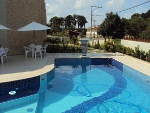 Outdoor pool - Excellent apartment in a village condominium. (Camacari)