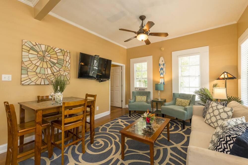 Nestled on a quiet lane in the heart of Old Town Key West, Rose Lane Villas is as close to the action as you\'ll get without sacrificing a good night\'s sleep. The one bedroom Villa Rosa is generously equipped for your Key West family gathering, reunion, destination wedding, and even just a romantic Key West getaway.<br><br>The number one reason why people choose the Rose Lane Villas is our fabulous location and proximity to all things worth doing in Key West. <br>1/2 block to Hard Rock Cafe<br>2 blocks to Margaritaville<br>1 1/2 blocks to Sloppy Joe’s<br>3 blocks to the Historic Seaport<br>4 blocks to Mallory Square<br>4.5 blocks to Schooner Wharf<br>6 blocks to Hemingway’s House<br><br>Email us for availability, even if we look full. Please be aware of scams asking for wire transfers or offers from Craigslist. If you have any questions, please call our reservations desk. Rose Lane Villas - Villa Rosa - 1 Bedroom - Downtown Key West