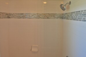 Combined shower/tub, hair dryer, towels, soap