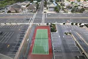 A multi-level parking structure with multiple lanes and a tennis court. - FREE DAILY ACTIVITIES & LINENS INCLUDED*! 2bed/2bath Quayh condo available for a mini-week! (Ocean City)