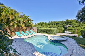 Outdoor pool, a heated pool - 1 Block to Beach on Private Lake Heated Pool, SPA  6937 Holmes Blvd. (Holmes Beach)