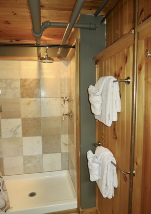 Shower, hair dryer, towels, toilet paper
