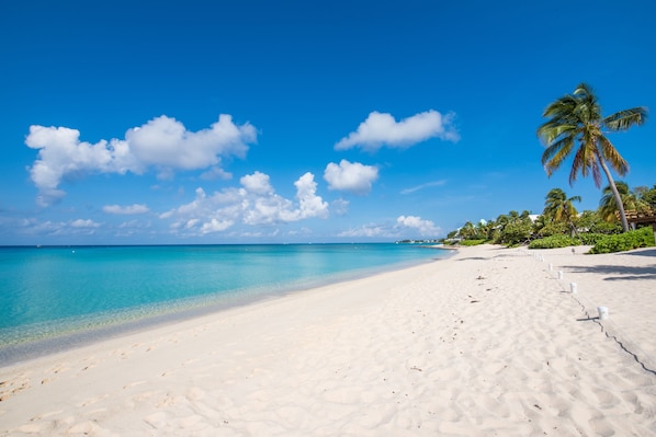 On the beach, sun-loungers, beach umbrellas, beach towels