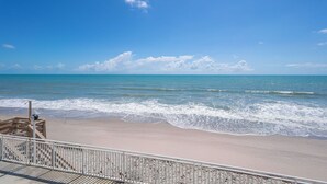 A beach with a wooden walkway and a railing. - Oceanfront 2BR Condo w/ Balcony & Panoramic Atlantic Views, Unit 226 (Satellite Beach)