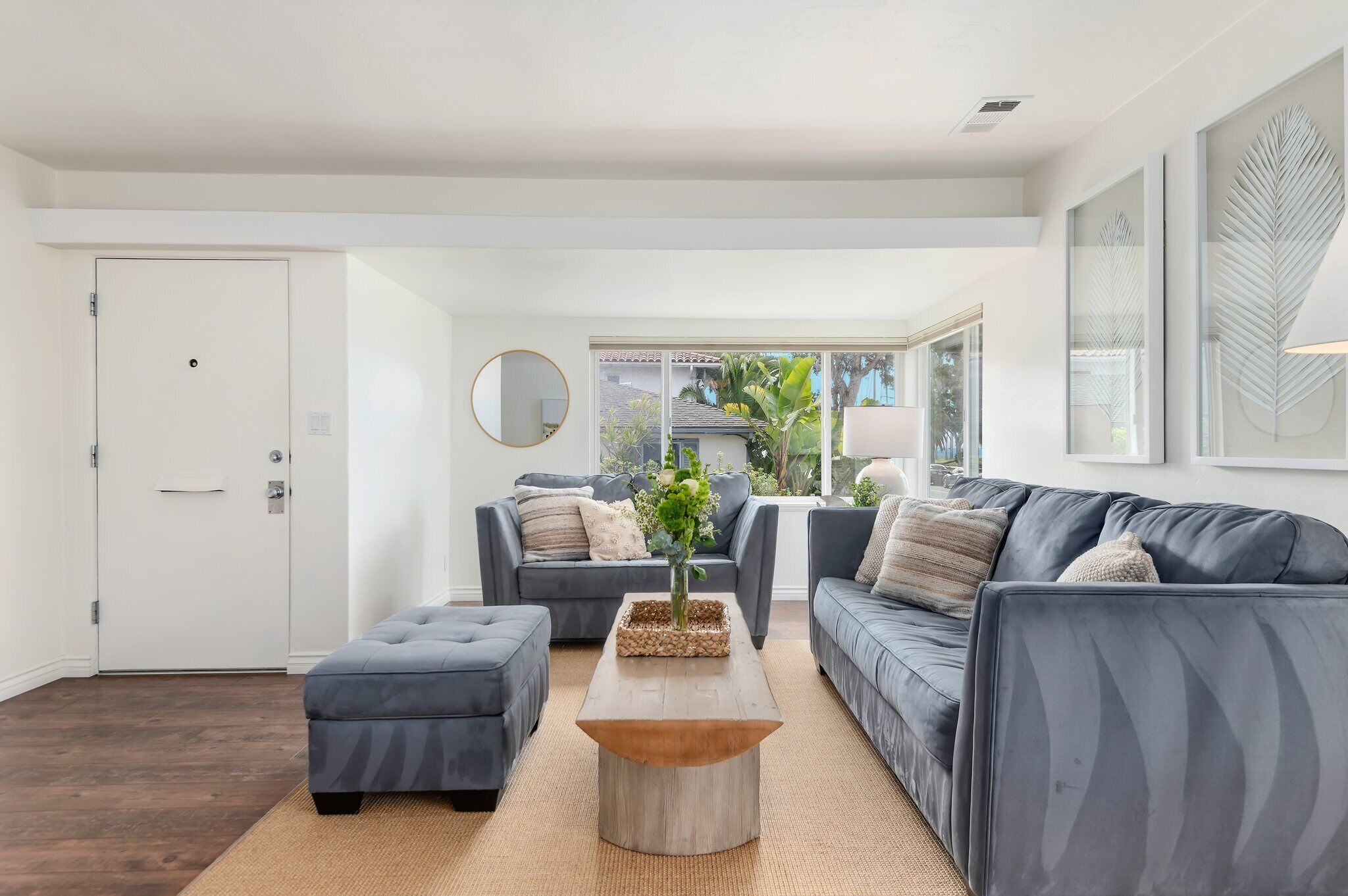 Coastal-Inspired Condo Just a Half Block Away From East Beach!