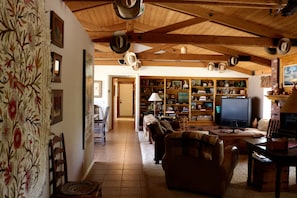 view from living room to hallway with two bedrooms and bath