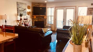 Smart TV, fireplace, DVD player, foosball