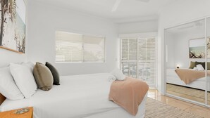 A modern bedroom with a large bed, white bedding, and a view of the city through floor-to-ceiling windows.