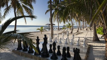 On the beach, sun-loungers, beach towels