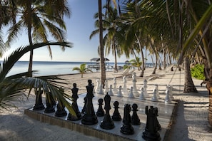On the beach, sun-loungers, beach towels