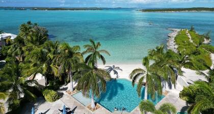 Waterfront Villa with Dock, Walk to Beach Club & Rusty Anchor Rest. 3b/r 3.5b/a