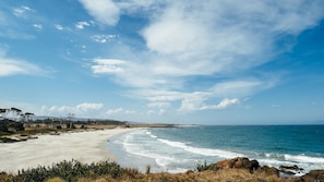 On the beach, sun loungers, beach towels