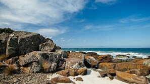 On the beach, sun-loungers, beach towels