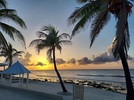 On the beach, sun-loungers. PLEASE COME AND RELAX ON OUR PRIVATE BEACH!