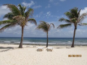 On the beach, sun loungers