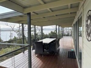 Outdoor dining - Esperance Landing, waterfront luxury (Brooks Bay)
