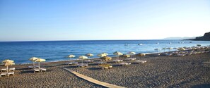 On the beach, beach towels