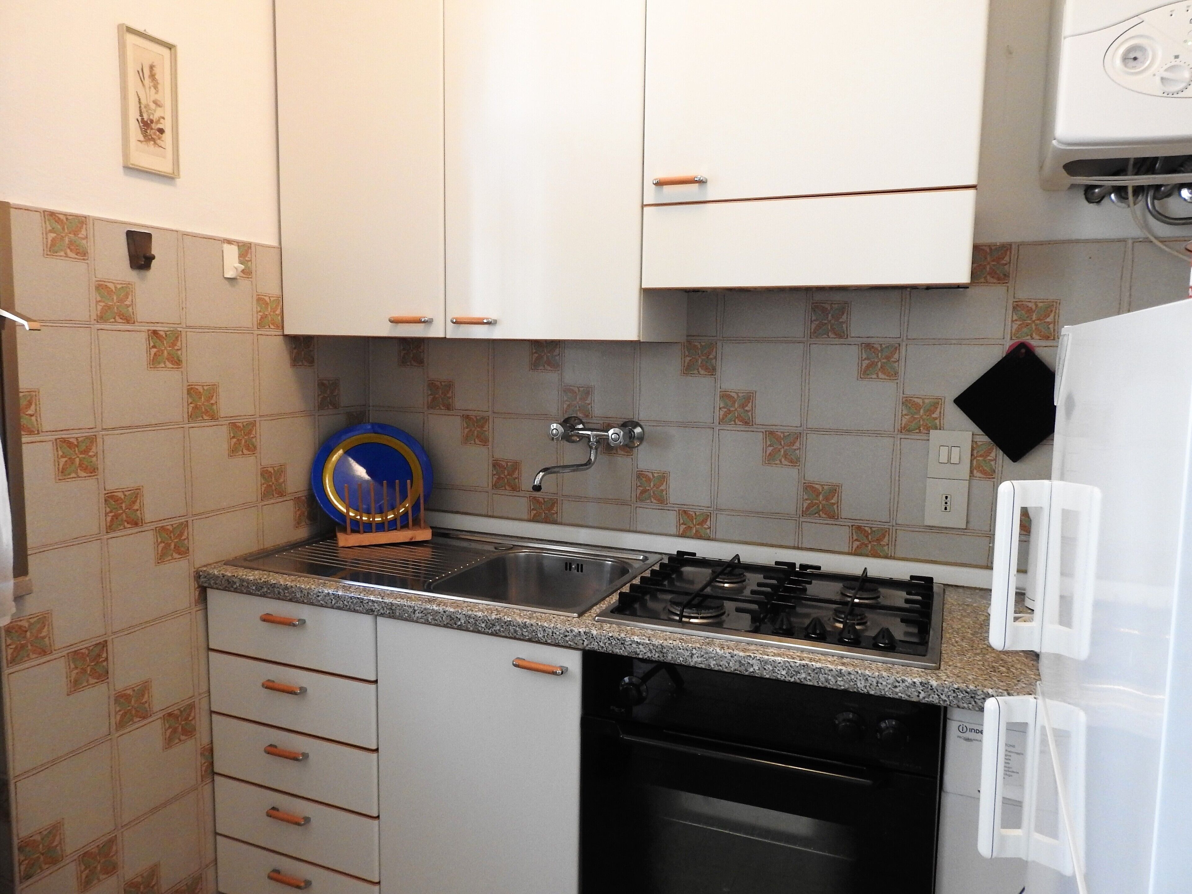 Walk to the beach! 5 bed apartment, ground floor with parking space.