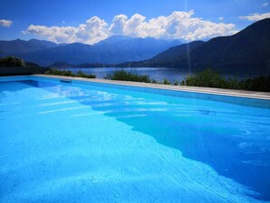 Outdoor pool, a heated pool, pool loungers