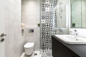 Shower, free toiletries, hair dryer, towels