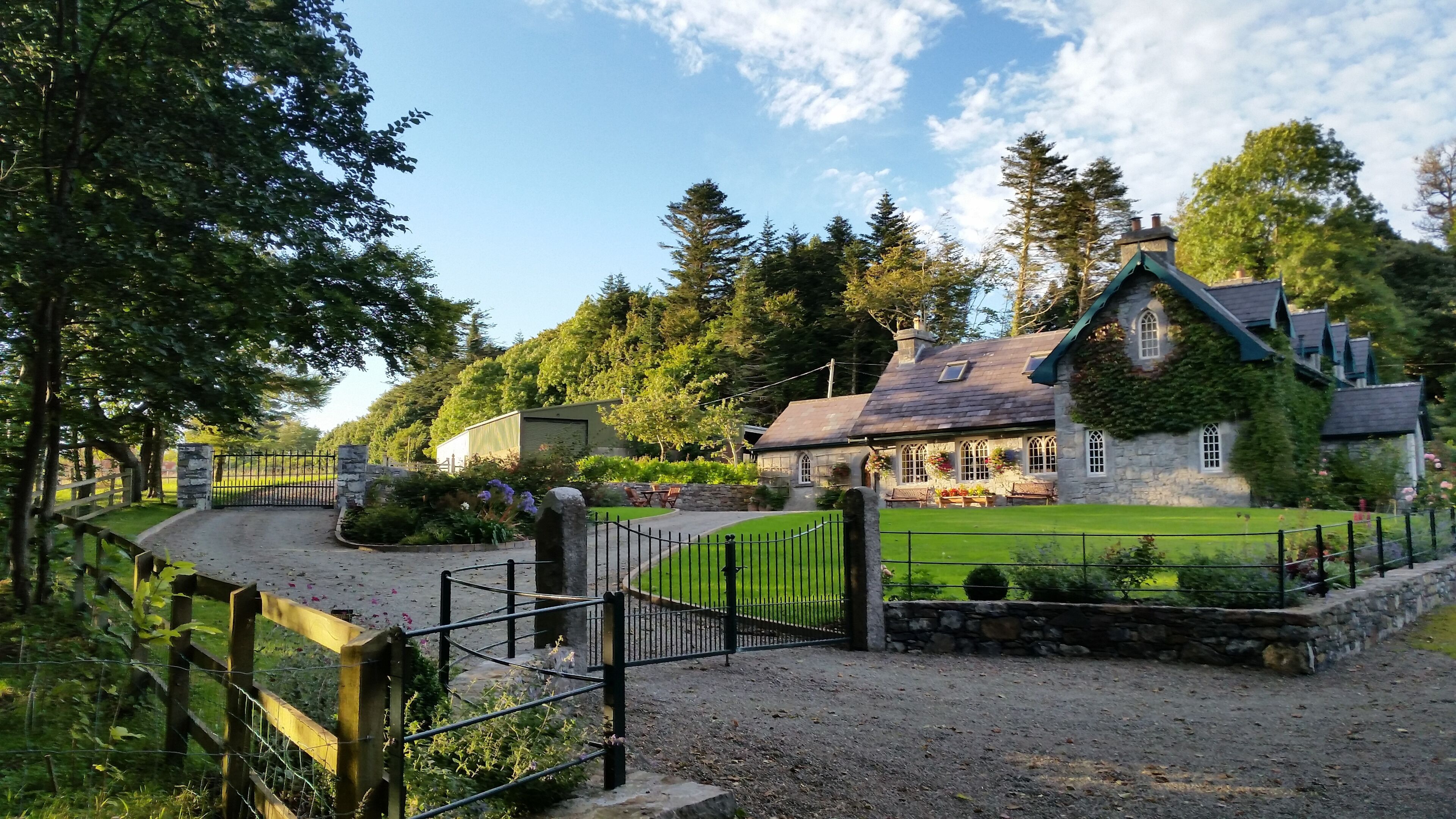 Rental entrance on left, garden and driveway 