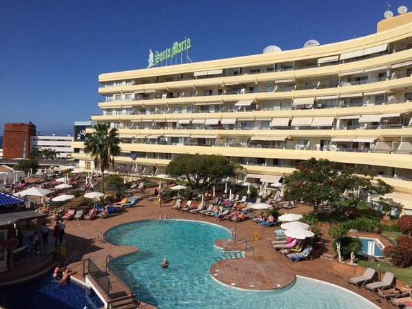 A heated pool, pool loungers