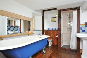 Bathtub, hair dryer, towels