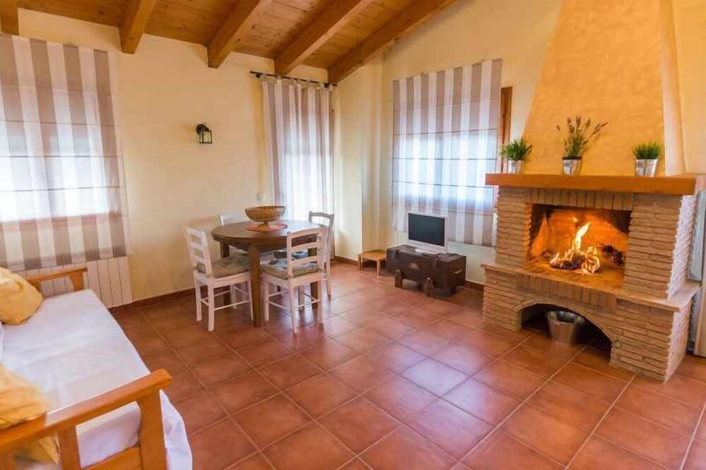 Lo Tossal I. Penthouse with fireplace and terrace