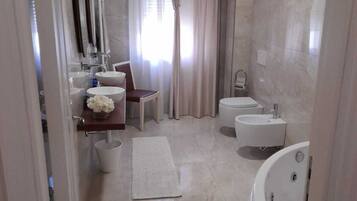 Bathtub, jetted bath, hair dryer, bidet