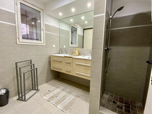 Shower, hair dryer, towels, soap
